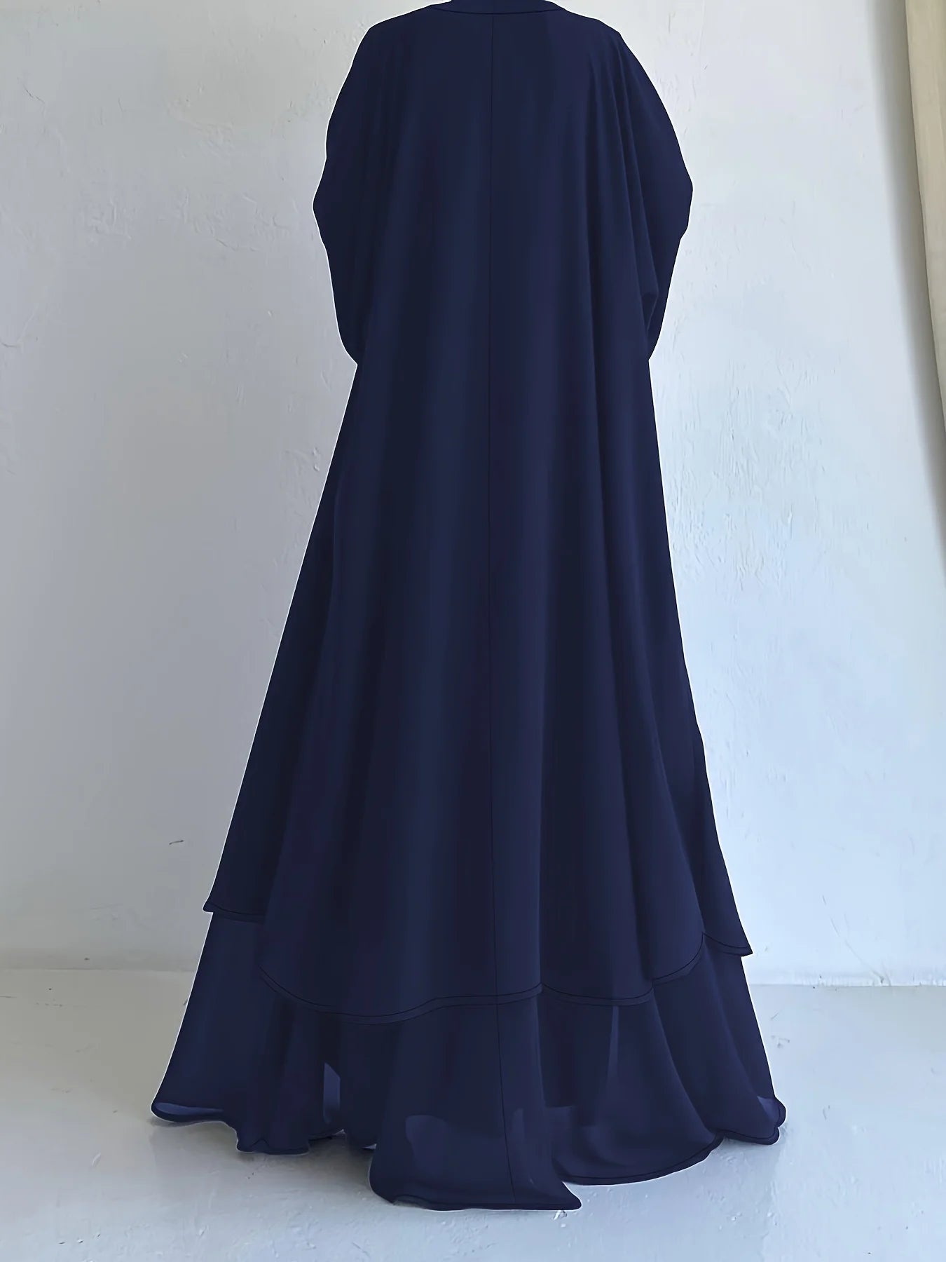 Muslim robe, a two-piece outfit consisting of a vest and a wrap dress, includes a belt.