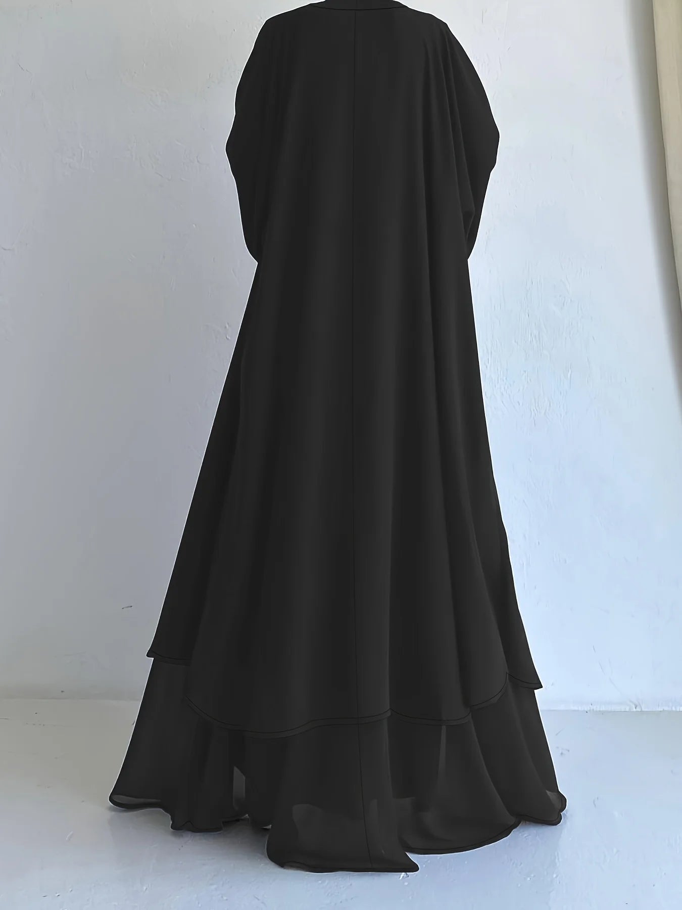 Muslim robe, a two-piece outfit consisting of a vest and a wrap dress, includes a belt.