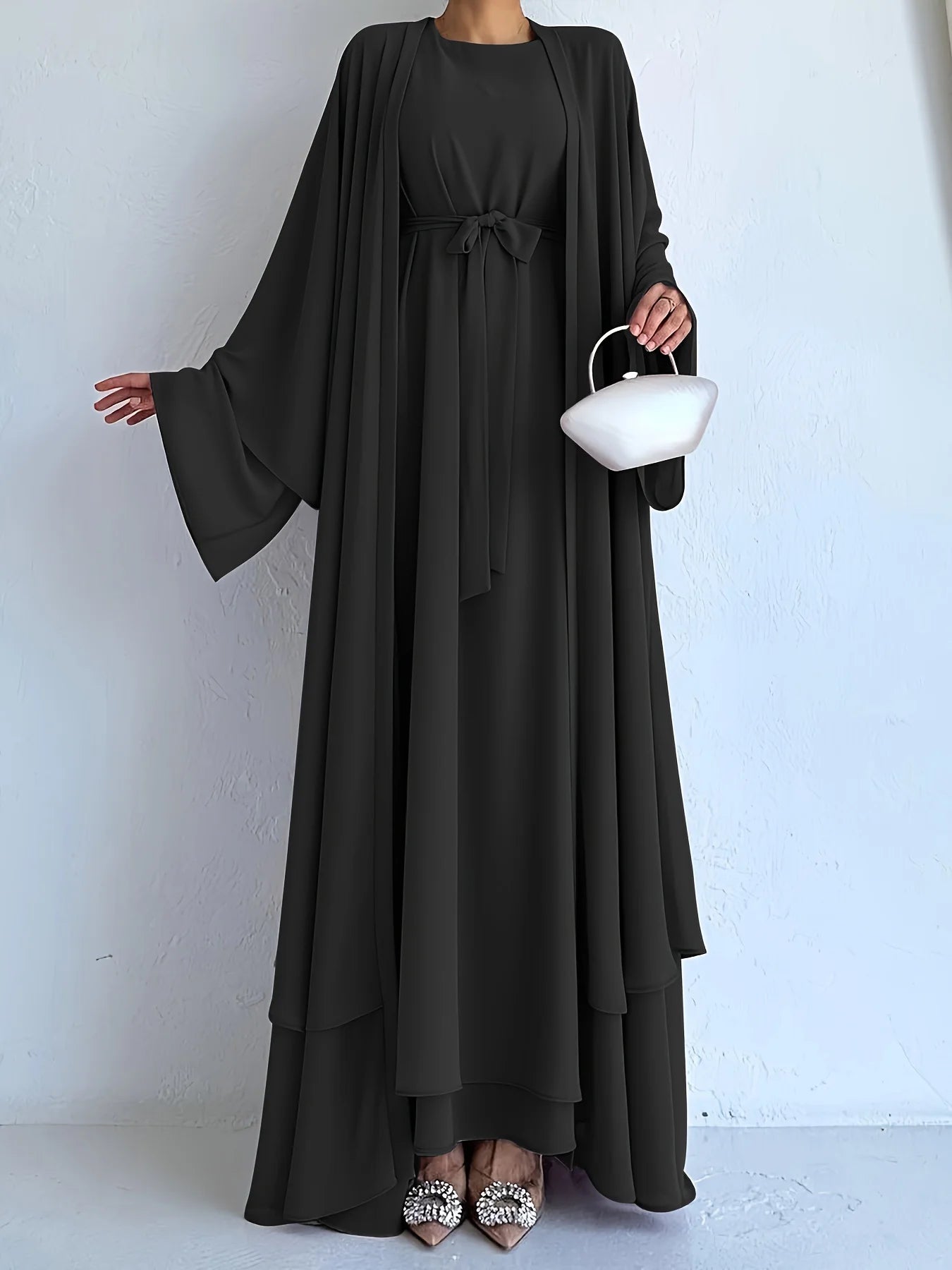 Muslim robe, a two-piece outfit consisting of a vest and a wrap dress, includes a belt.
